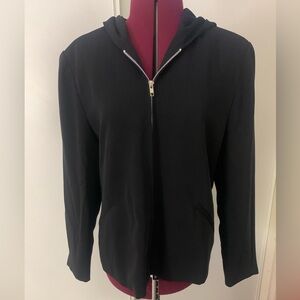 Black hooded lined jacket, faux front pockets, seems to be a size M
